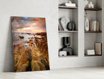 Golden Coast artwork anchoring a wall with coastal golden-hour palette