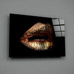 Close-up detail of gilded folds and metallic ridges along lip line