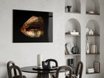 Gold Lips glass print enhancing a powder room with cinematic drama