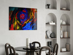 Cobalt Vortex glass print enhancing a man's office with cinematic drama