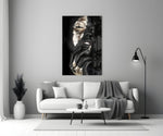 Gilded Gaze glass wall art styled above a sofa in a master bedroom