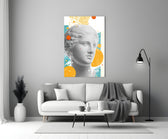 Venus Collage glass wall art styled above a sofa in a living room