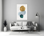 Ochre Stack glass wall art styled above a credenza in a living room