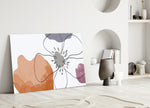 Scandi Bloom glass wall art styled above a sofa in a master bedroom