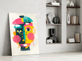 Pop Face artwork anchoring a wall with bold modernist palette