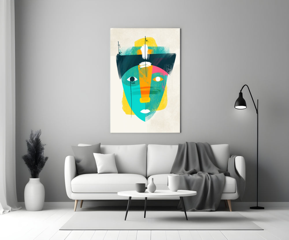 Tribal Mask glass wall art styled above a console in a creative office