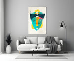 Tribal Mask glass wall art styled above a console in a creative office