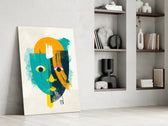 Amber Face artwork anchoring a wall with bold modernist palette