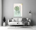 Sage Leaves glass wall art styled above a console in a bathroom