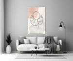 Line Monstera glass wall art styled above a bench in a hallway