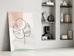 Line Monstera artwork anchoring a wall with scandi botanical palette