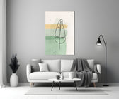 Line Tropical glass wall art styled above a credenza in a living room