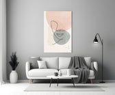 Line Portrait glass wall art styled above a sofa in a master bedroom