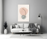 Peach Arc glass wall art styled above a credenza in a master bedroom