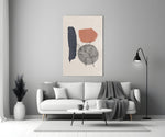 Leaf Circle glass wall art styled above a side table in a hallway