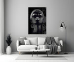 Silver Crown glass wall art styled above a sofa in a master bedroom