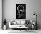 Silver Crown glass wall art styled above a sofa in a master bedroom