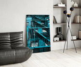 Blue Stairs glass print enhancing a gaming room with cinematic drama