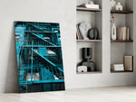 Blue Stairs artwork anchoring a wall with cool urban palette