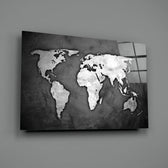 Grunge World Map close-up showing chalked continents on weathered black