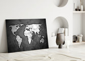 Grunge World Map glass wall art styled above a sofa in a man's office