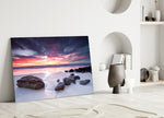 Beach Sunset glass wall art styled above a sofa in a living room
