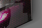 Pixel Lips panel catching low light to reveal its tactile dot