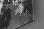 Chalkboard Map panel catching brass-light to reveal its tactile mark