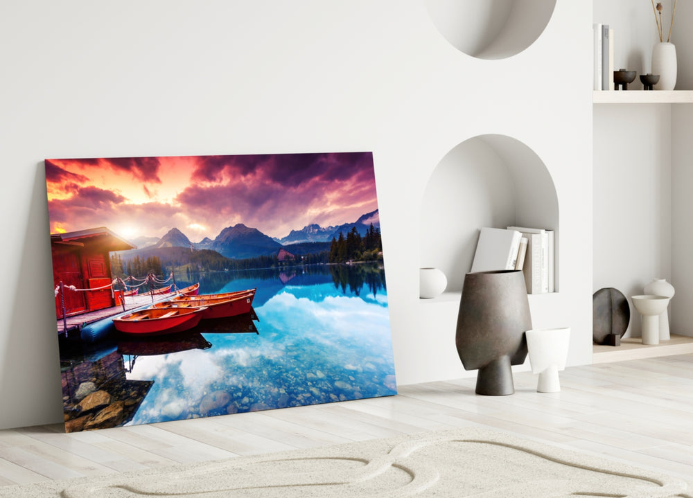 Lake Boats glass wall art styled above a fireplace in a living room