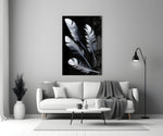 White Feathers glass wall art styled above a bed in a master bedroom