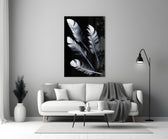 White Feathers glass wall art styled above a bed in a master bedroom