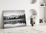 Misty Lake glass wall art styled above a credenza in a master bedroom