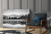 Misty Lake artwork anchoring a wall with serene monochrome palette