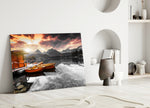Sunrise Lake glass wall art styled above a fireplace in a living room