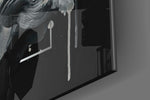 Emerald Poseidon panel catching brass-light to reveal its tactile carve