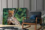 Ocelot Gaze artwork anchoring a wall with biophilic wildlife palette