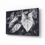Monochrome-tropical panel bringing moody drama to a contemporary biophilic space