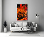 Fire Dahlia glass wall art styled above a credenza in a master bedroom