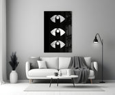 Silver Lip Stack glass wall art styled above a bed in a master bedroom