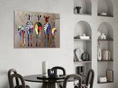 Colorful Zebras glass print brightening a welcoming hallway