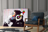 DJ Chimp artwork anchoring a wall with bold music palette