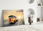 Caravan Sunset glass wall art styled above a credenza in a hallway