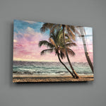 Pastel Palms close-up showing palm fronds against pink-cyan sky