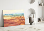Watercolor Ranges glass wall art styled above a credenza in a master bedroom