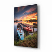 Lakeside-sunset panel bringing serene drama to a contemporary cabin