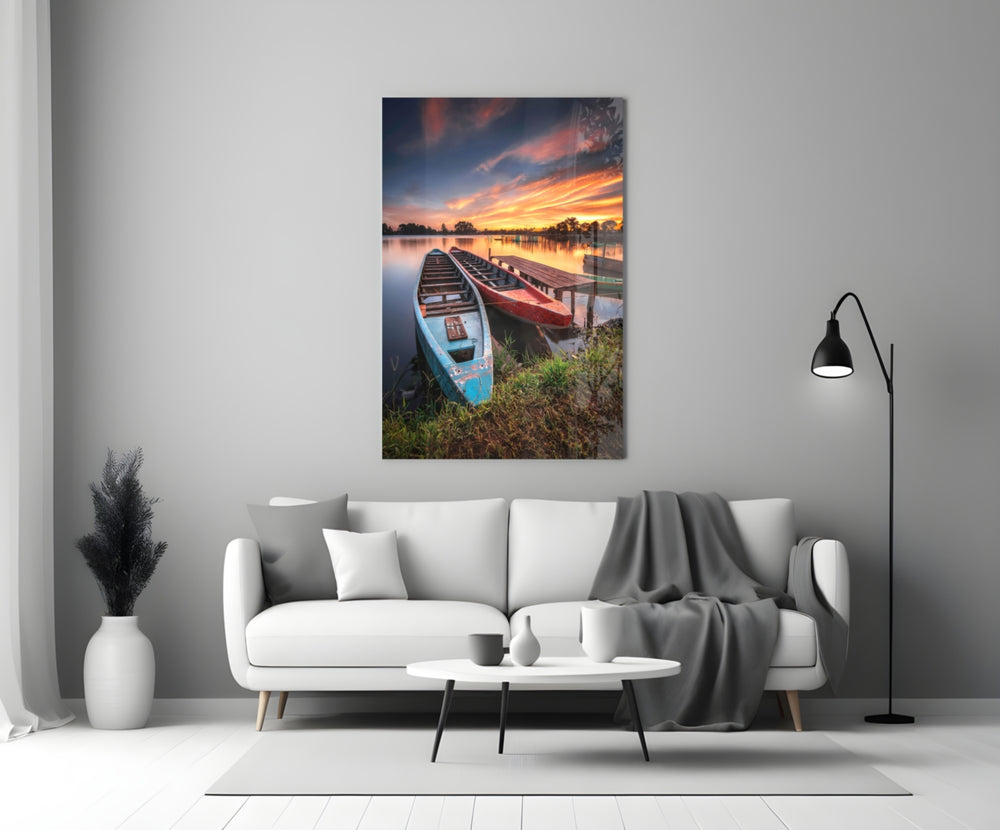 Lakeside Boats glass wall art styled above a sofa in a living room