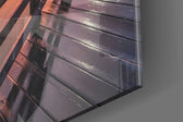 Pier Sunset panel catching brass-light to reveal its tactile mirror