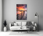 Pier Sunset glass wall art styled above a credenza in a master bedroom