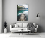 Dock glass wall art styled above a credenza in a living room