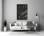 Leaf glass wall art styled above a console in a master bedroom